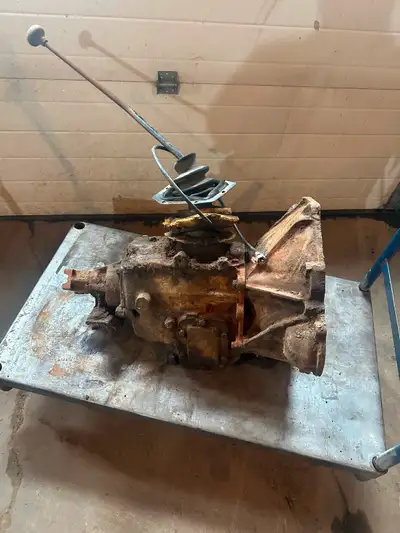 70’s ford truck t18 4 speed transmission. Removed from a parts truck with 302. Bell housing should f...