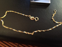 Yellow Gold Delicate bracelet 14K..7 inches...