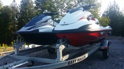 Pair of Yamaha Jet Skis and double trailer. One model is FZR and is capable of 95mph. The other mode...
