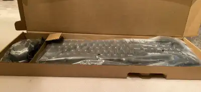 Black keyboard and mouse. Brand new still in box. Manhattan brand