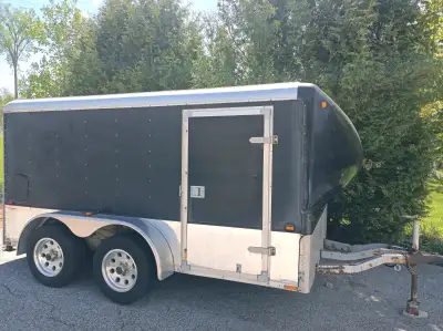 For sale: 2002 Wells Cargo Tandem-Axle "Cycle Wagon" Enclosed Trailer with front wheel guides for tw...