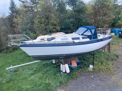 Cs27 shoal draft on cradle for sale. Opening ports, wheel steering. Roller furler. Ysb 8 Yanmar runs...