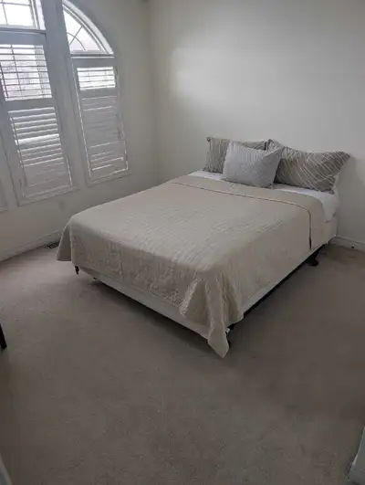 Clean, freshly painted large bedroom in a clean , quiet home. Shared kitchen and bathroom All utilit...