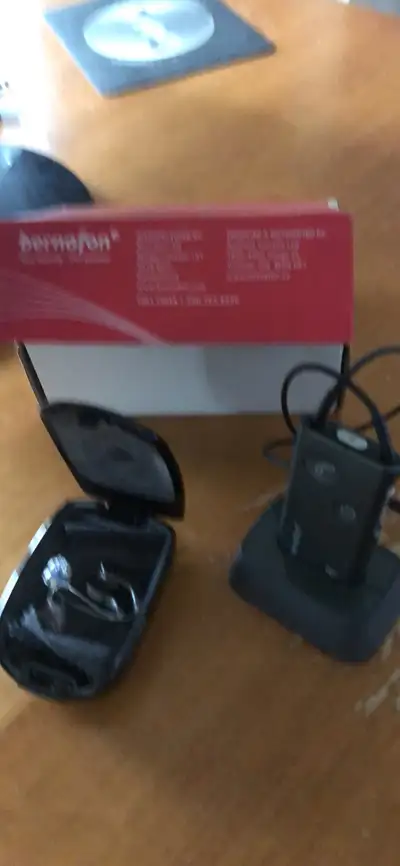 Lightly used hearing aids and charger, best offer.