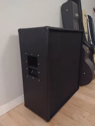 Custom speaker cabinet houses two 60w Celestion Vintage-30 drivers, used in far too many cabinets an...