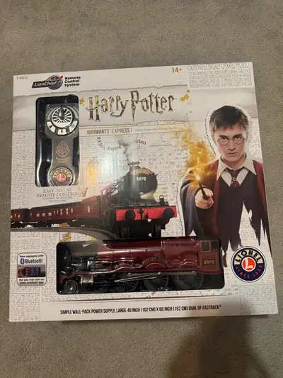 I have a NIB Lionel 6-83972W Harry Potter Hogwarts Express Bluetooth App Model Train Set asking $750...