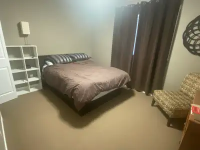 Fully furnished room with queen bed for rent in shared house with mature female and dog. Perfect for...