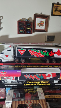 60 CANADIAN TIRE TRUCKS TO SELL SYILL IN BOXES NEVER OPENED