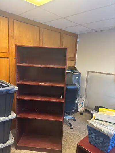 I'm offering a used office set including a bookshelf, desk, two chairs, and a loveseat. This set is...
