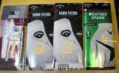 assorted golf gloves different names different sizes. new, View more