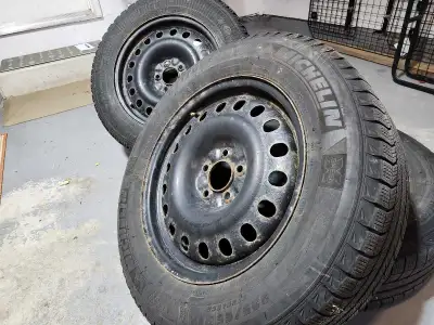 Two pairs of winter tires mounted on steel rims (4.5 inch/114 mm x5 bolt pattern). 225/65R17. One pa...