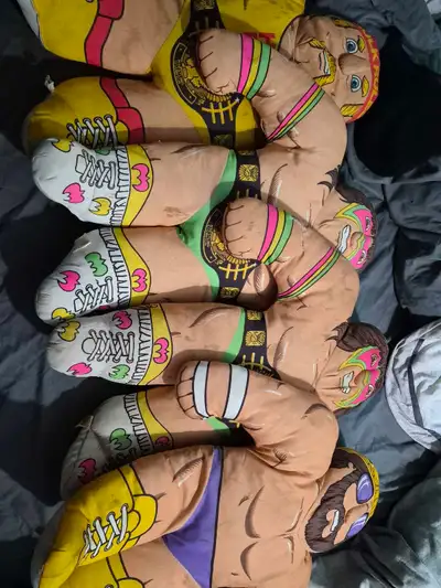 Wwf wrestling buddies All have stains, one tiny rip on one of the ultimate warriors chest 150 takes...