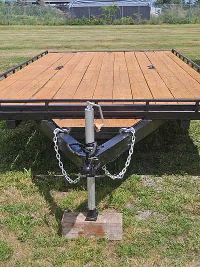 16 ft. bed X 8ft wide. 26 inch deck height. Tandem axles. Ideal for transporting 4 ATV's or as I use...