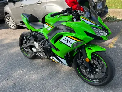 2025 Kawasaki Ninja 650 KRT, bike is in excellent shape, basically new with only 2400 Km. Original o...