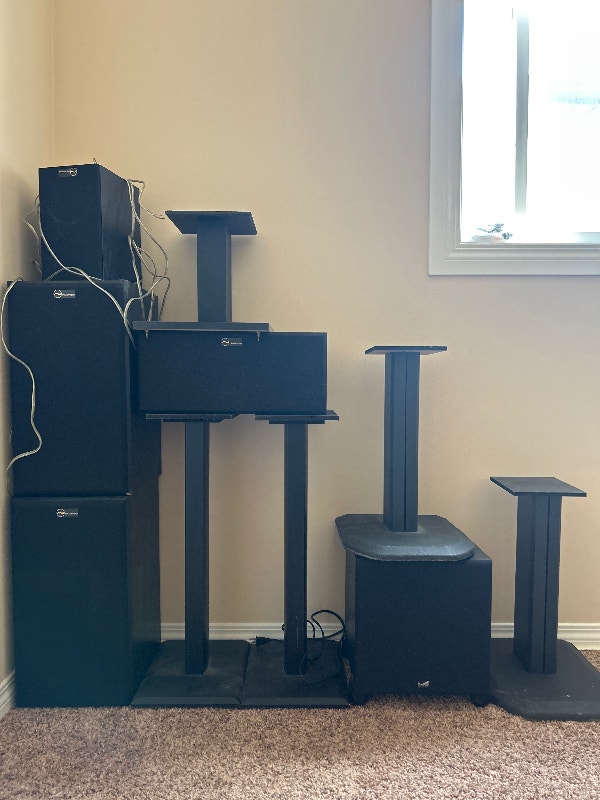 Nuance Home theatre speakers and stands. Plus subwoofer. Stereo