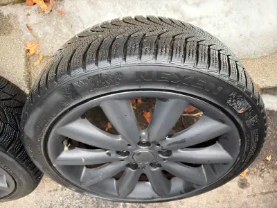 Set of winter tires on Mini Cooper rims. 2 are Pirelli and 2 are Nexen. 205/45R17. In very good used...