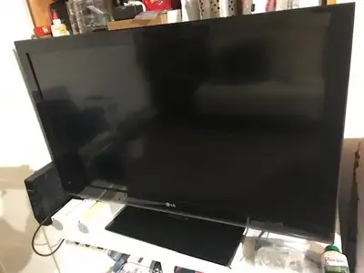 42” Lcd LG TV with free small TV stand & remoter, View more