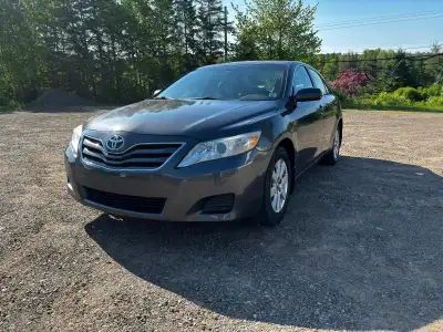 Reliable and fuel-efficient sedan featuring AC, cruise control, power locks, and power windows. Just...