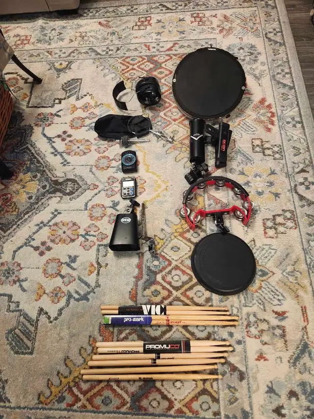 Assorted drum and percussion items.