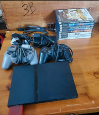 Slim Playstation 2 Console PS2-2 Mint Condition/8 Games & 2 Cont
