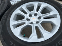 A136. 2023 Chevy OEM rims and General Grabber all season tires