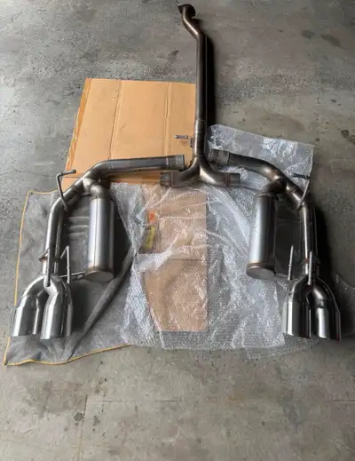 Selling my Magnaflow cat back exhaust 2.50” with 4” quad tips, comes with all the hardware and gaske...