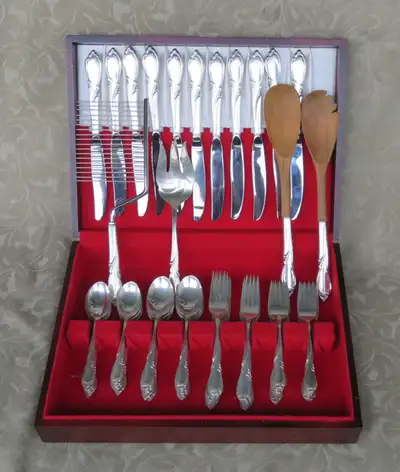 For sale beautiful 65 pc International Sterling flatware Rhapsody pattern. Sterling silver. Include:...