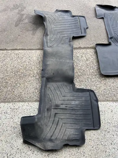 2017 YukonDenali weather tech mats Will rinse and clean up for a new owner No rips / tears or holes....