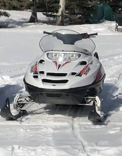 Electric start, reverse, hand/thumb warmers, excellent condition always stored inside.