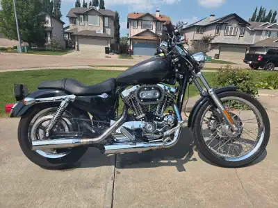 Selling a 2005 Harley-Davidson Sportster XL Custom 1200 with only 18,158 km. This bike is in excelle...