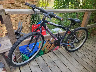 Red and black Supercycle bike, 24 inch wheels, H10 steel frame. In very good condition.