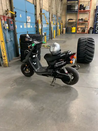 I'm selling my black Yamaha Zuma, a fun and reliable scooter for city commutes. This used scooter of...