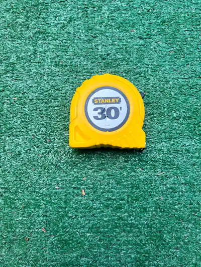 Stanley 30-foot tape measure. Yellow casing, metal belt clip, View more