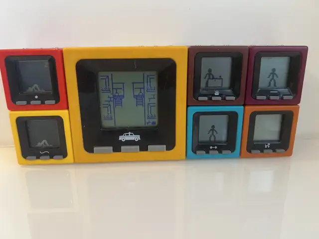 Radica Cube World Collection Of 7