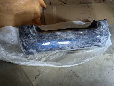 Blue Metallic bumper, For 2008-2011 Nissan Sentra brand new.
