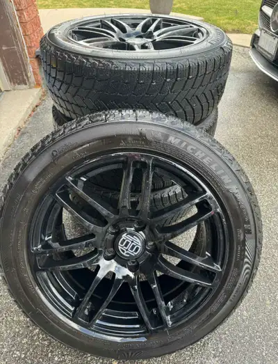 Set of four Michelin X-Ice Snow winter tires with glossy black alloy rims. Like new. No scratch. Pur...