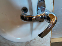 A Pair of Bathroom Sink with faucet