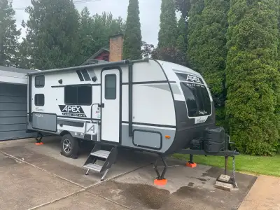 Condition. Milage: Under 4000 km. Sleeping Capacity: 5. Fridge: 6 cu ft. Oven: Propane & Electric po...
