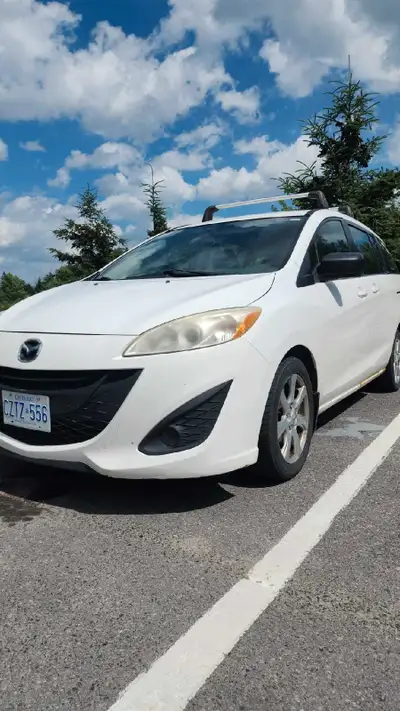 Selling for my father, well maintained 2012 mazda 5 with 239k Everything works perfectly no mechanic...