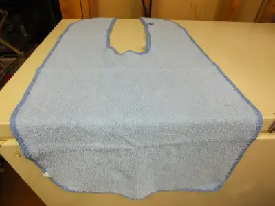 TWO ADULT STYLE TERRY CLOTH BIBS - $10.00, View more