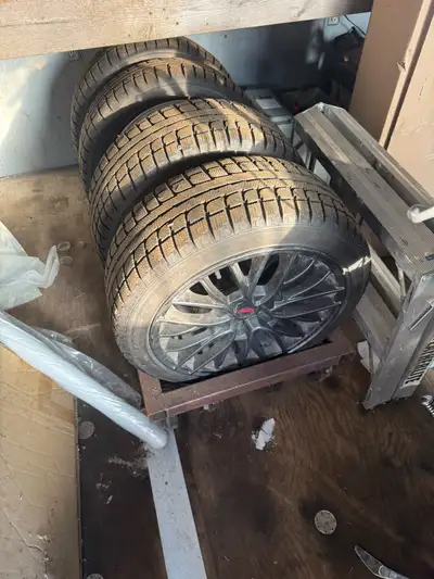Winter rims and tires balanced ready to go with half of last season on them basically brand new for...