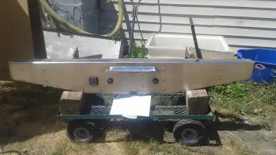 Extreme Duty truck bumper has built in side steps, hooks , 7 pin trailer plug etc also has cut out f...