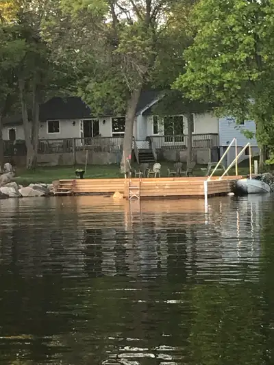 3 bedroom summer home with A/C on beautiful lake Nipissing with 30x 60 dock with deep water . Includ...