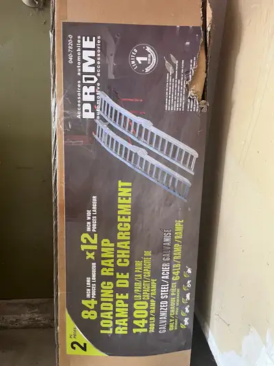 Brand new in box set of heavy duty loading ramps.