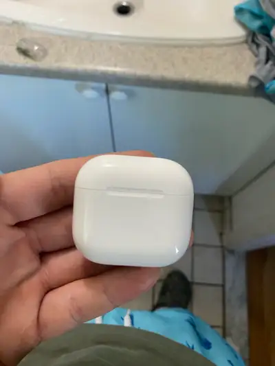 AirPods 4 with noise cancellation and a case, View more