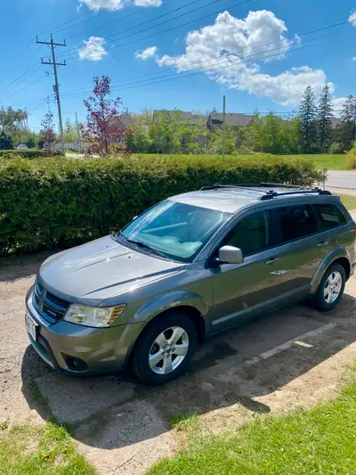 Selling my used 2012 Dodge Journey SXT, a reliable and spacious SUV that's ready for new adventures!...
