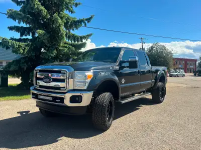Black Metallic 2015 FORD F350 SRW short box crew cab Lariat. 6.7 liter diesel Power Stroke engine. D...