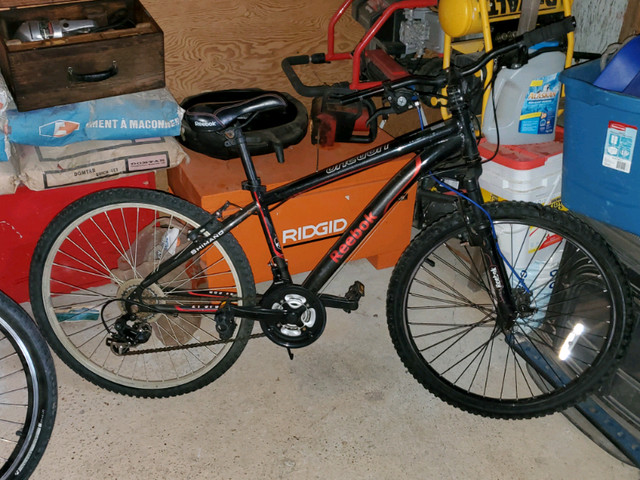 Reebok mountain bike bicycle in Road in St. Albert