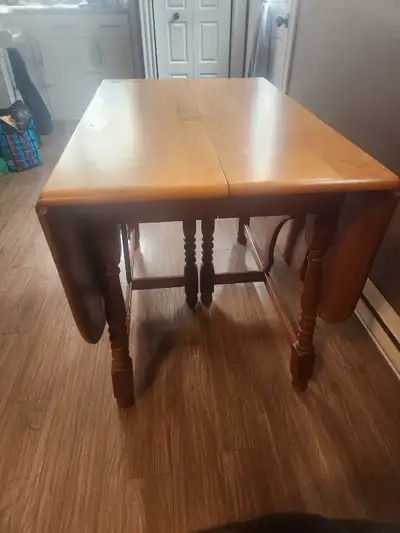 Antique drop leaf dining table. Ideal for a large family or an individual who enjoys restoring furni...