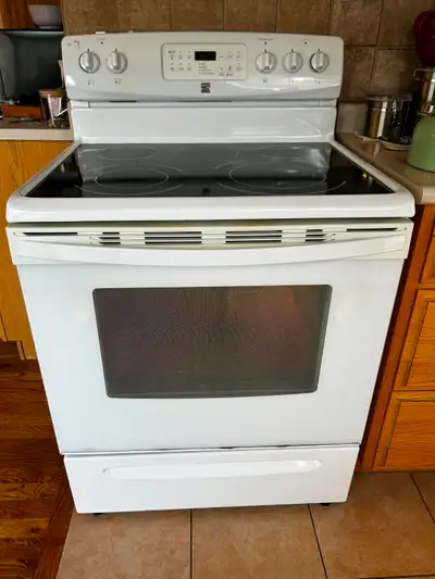 NEW PRICE!!!  Refrigerator and Stove/Range for Sale, View more